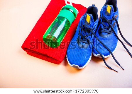 Different tools for sport on light coloured background