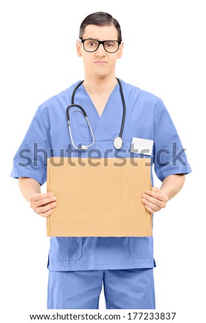 Grumpy male doctor holding a cartoon sign isolated on white background