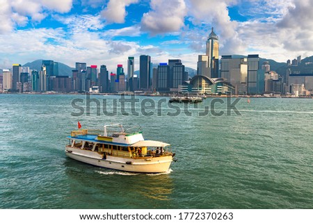 Victoria Harbour in Hong Kong at summer evening