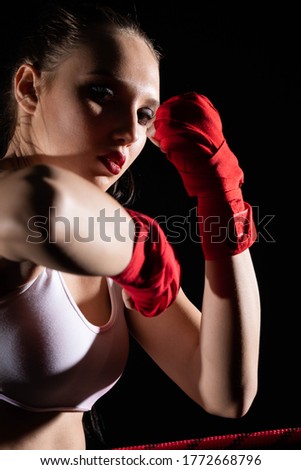 Combination of elbow punches in a sport called for short. Professional player . Strong woman.