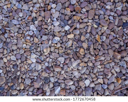 Small multi colour stones on the walkway