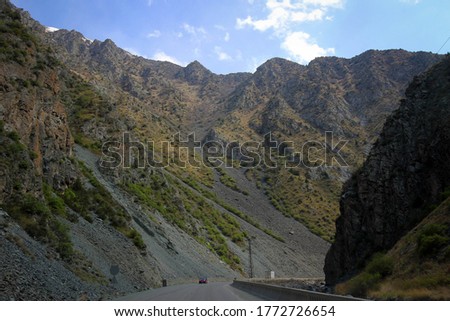 Spring road landscape of Teo-Ashuu mountain pass, Tian Shan range, Kyrgyzstan
