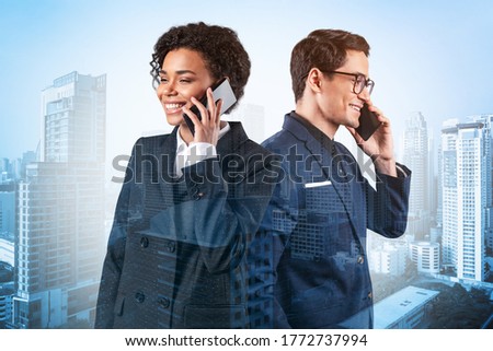 Two colleagues in suits as a part of multinational corporate team pensively processing conference call by phone, Bangkok cityscape. The concept of consultants as problem solvers. Double exposure.