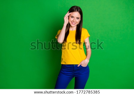 Portrait of charming nice youth girl feel shy modest meet new male friend touch long haircut wear good look outfit isolated over vivid color background