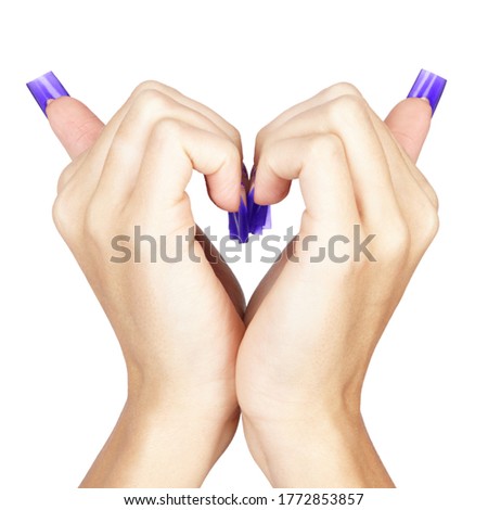 Heart sign by hands with blue french acrylic nails manicure  isolated on white background