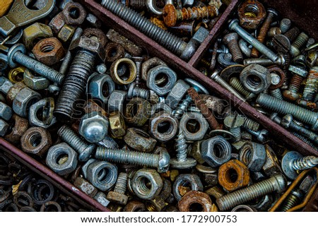 nut screws and nails iron rusty old close-up