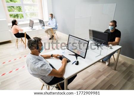 Call Center Customer Service Agents Wearing Face Masks