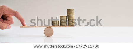 Financial Leverage Balance And Inflation Insurance Concept Royalty-Free Stock Photo #1772911730