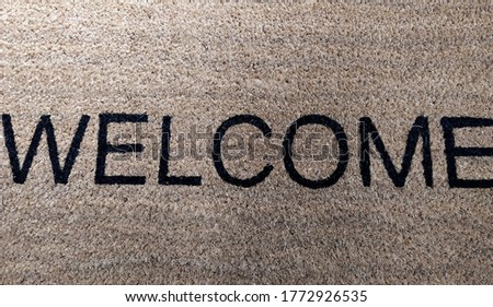 Italy: Welcome written on the doormat.
