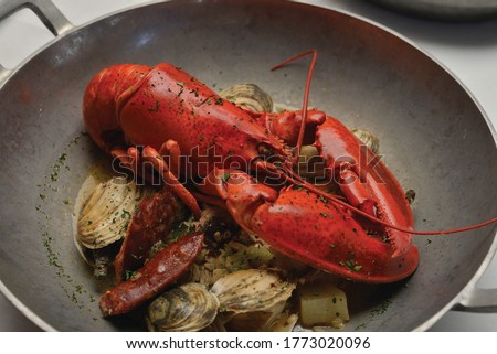 New England Boiled Lobster Dinner with Steamers Clams Fresh Catch Royalty-Free Stock Photo #1773020096