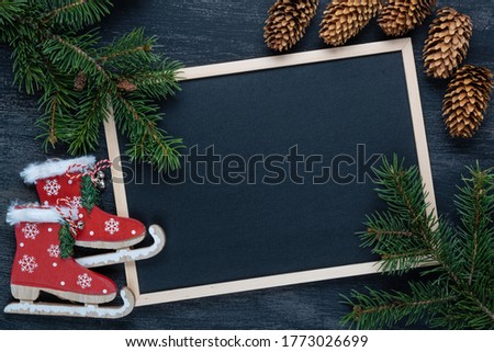 Black blackboard with christmas tree. Copy space.	