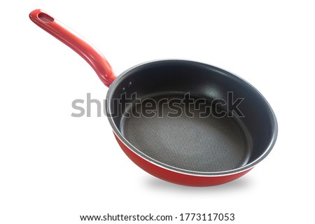 Modern non stick surface frying pan or skillet or sauce pan in red and black color on white isolated background with clipping path. Perfect studio shot cookware and utensils concept for cooking food. Royalty-Free Stock Photo #1773117053