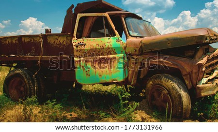 Rustic old chevy farm truck with green door used as target practice on an abandon farm near westover maryland somerset county  Royalty-Free Stock Photo #1773131966