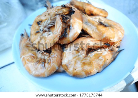 Closeup grilled shrimp on dish.Selective focus.