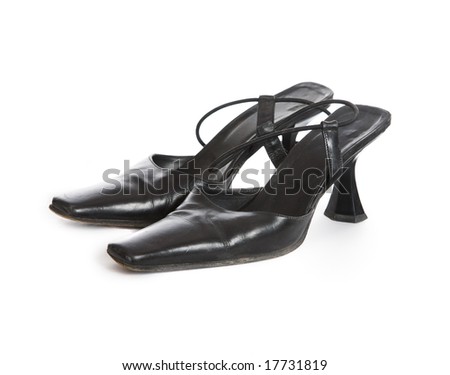 Female varnished shoes on a white background