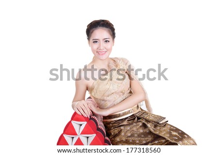 Woman wearing typical thai dress isolated on white background