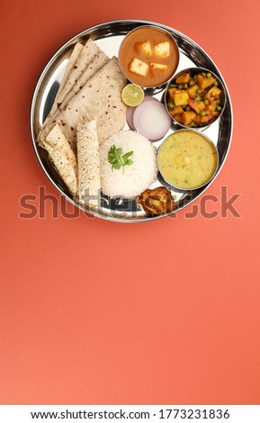 Indian Vegetarian Thali or Indian whole meal Royalty-Free Stock Photo #1773231836