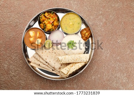 Indian Vegetarian Thali or Indian whole meal Royalty-Free Stock Photo #1773231839