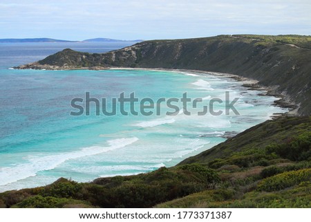 Great Southern Ocean waves roll in onto scenic beach along the Twilight Beach Road Tourist Drive, Esperance, Western Australia.
