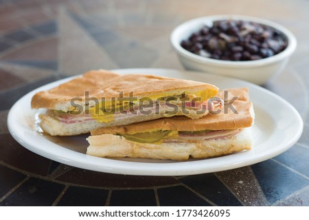 Cuban sandwich with rice and beans Royalty-Free Stock Photo #1773426095