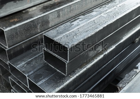 Rolled metal products, steel pipes with rectangular cross-section, close-up photo