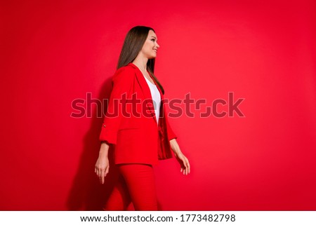 Profile photo of attractive business lady bossy successful person walk conference seminar wear luxury office blazer trousers suit white shirt isolated bright red color background