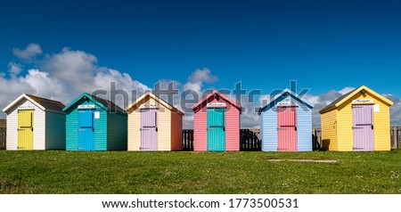 Beach huts at Amble Seafront  Royalty-Free Stock Photo #1773500531