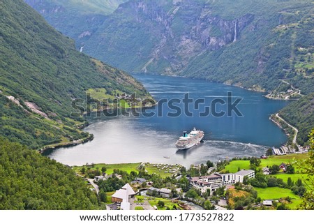 Geiranger Fiord in Norway. Cruise ship in harbor. Royalty-Free Stock Photo #1773527822
