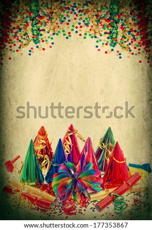 party decoration. garlands, streamer, carnival hats and confetti on white. festive retro style background