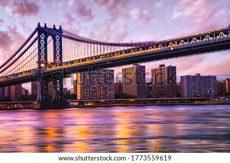 Beautiful Manhattan Bridge from Brooklyn to New York City seen at sunset