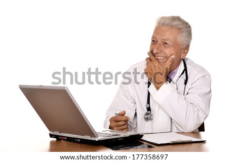 Portrait of medical doctor at work over white background
