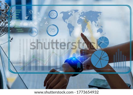 Double exposure of businesswoman hand touch business virtual interface icons chart, Digital online marketing concept. Background toned image blurred.