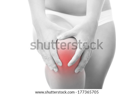 Knee pain. Woman Isolated on white background
