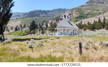 a white church in the wilderness