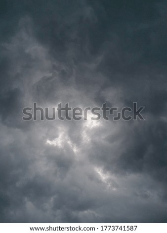 Dark storm clouds forming in the sky.