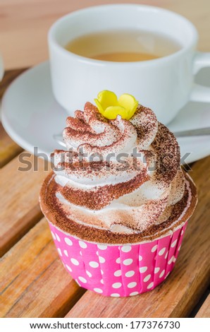 White cream cupcake with chocolate
