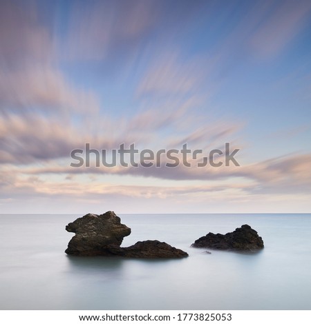 Long exposure shot of sea stacks and clouds in the morning, Mie Prefecture, Japan