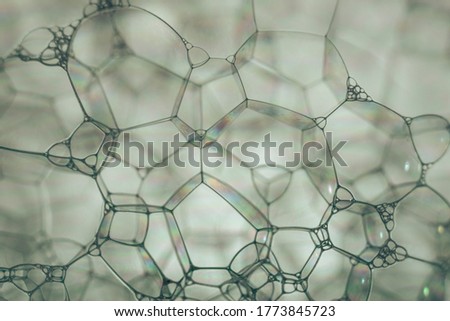 Close up Beautiful abstract soap bubbles. Background pattern for design. Macro photography view.