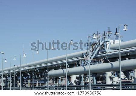 Pipeline and pipe rack of petroleum industrial plant. Offshore Industry oil and gas production petroleum pipeline.  Royalty-Free Stock Photo #1773956756