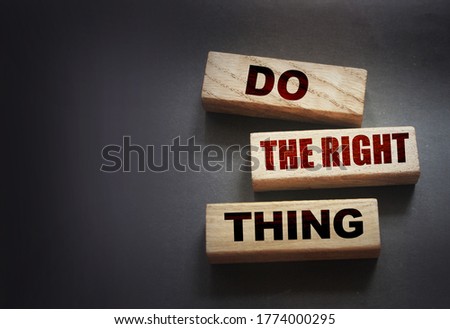 Do the right thing words written on wood blocks. Earnings and professional skills concept. Saving and investment concept.