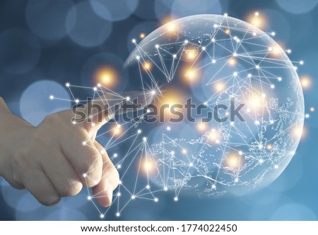 hand touching global network.(reach To World)