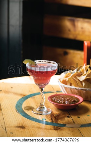 margarita with tortilla chips and salsa Royalty-Free Stock Photo #1774067696
