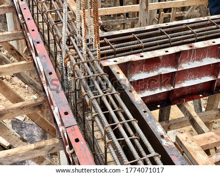 Stirrups to make beam structure, preparing for reinforced concrete column.Construction site.