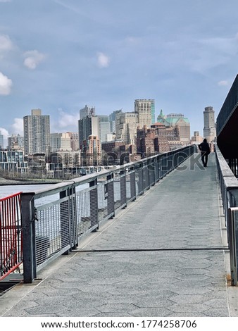 photo of a view from a ramp to the hudson river and across brooklyn in manhattan