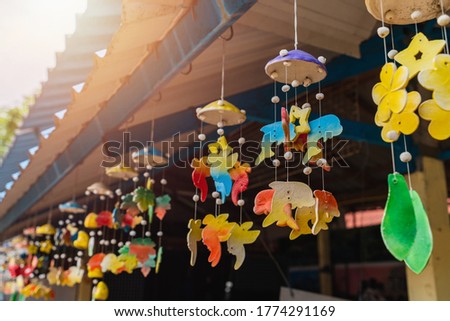 Cute colorful mobile hanging on the roof