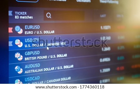Trading pair on stock market or forex trading platform. Economic trends and stock exchange.  Royalty-Free Stock Photo #1774360118