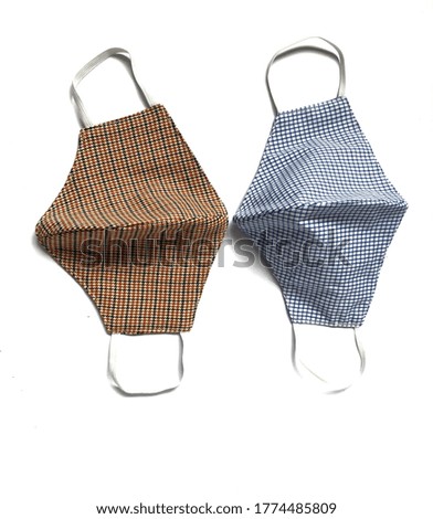 Fabric  multi color face mask on white background