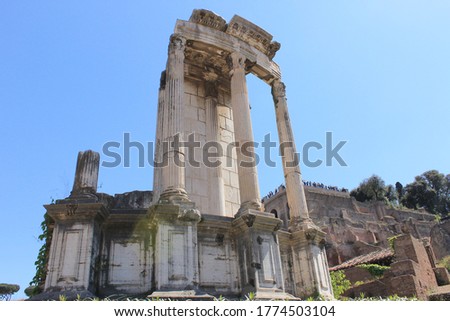 In the ancient city of Rome stands the temple of Saturn, visible today in the imperial forums.
