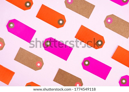 Blank label tag isolated on pink background. Price tag. Sale concept.