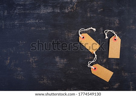 Blank label tag isolated on dark background. Price tag. Sale concept.